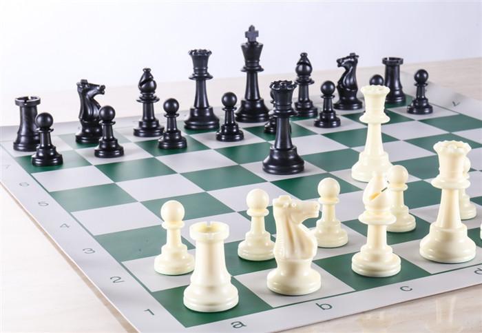 Tournament-style chess board with pieces in starting position.